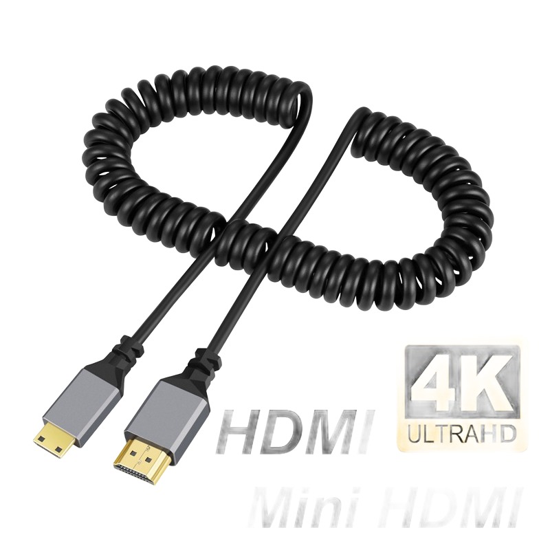 Cable videoprojecteur en spirale extensible jusqu a 2,4 m, vue de trois quarts